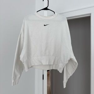 Nike Women's Off-White Cropped Crewneck Sweatshirt with Black Swoosh